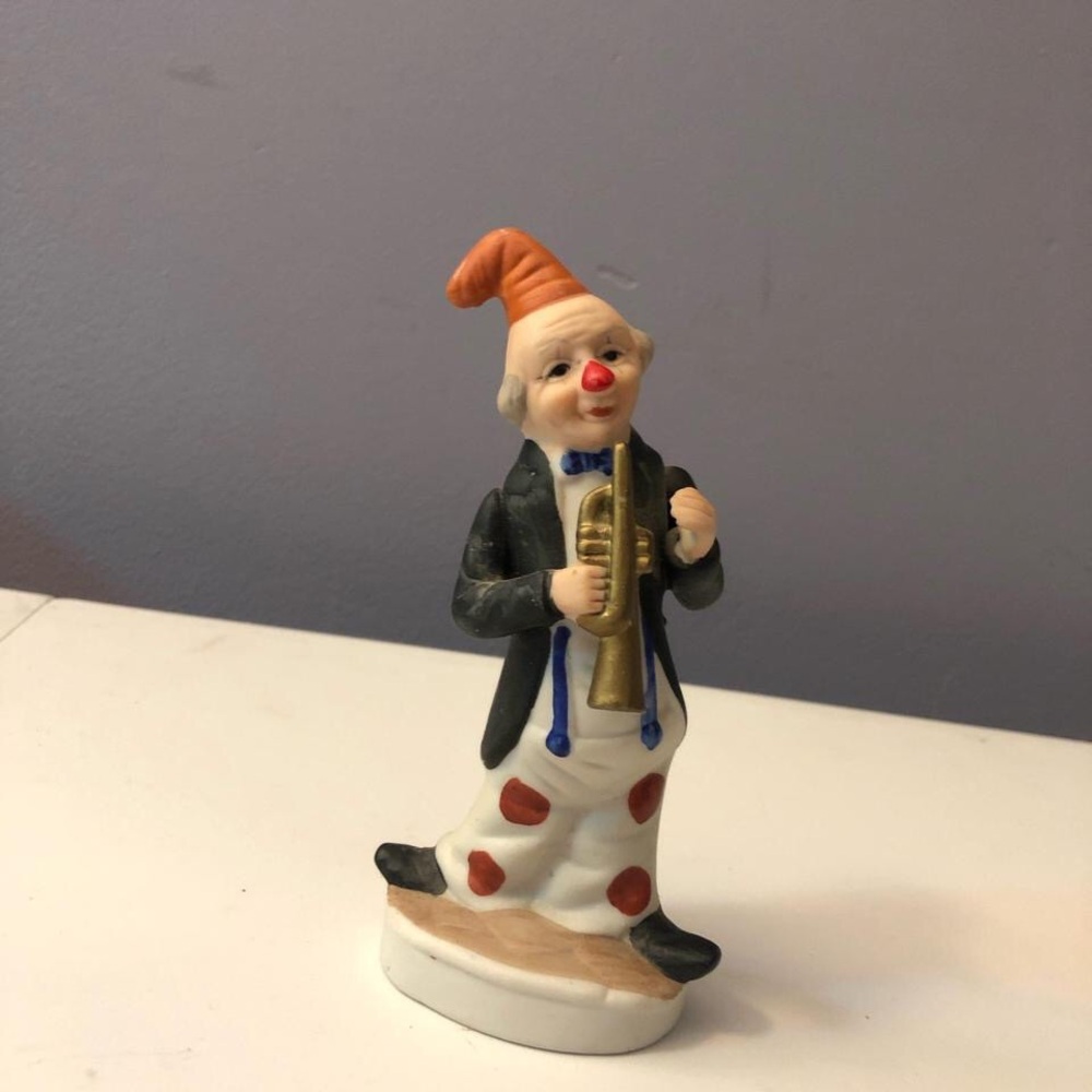 Vintage Multicolor Clown Figurine with Trumpet